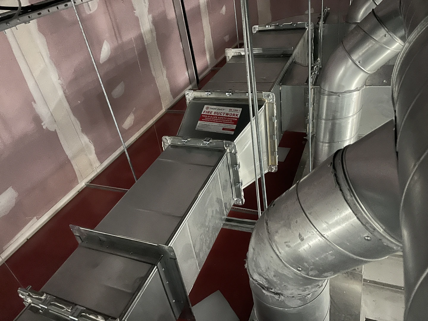 Fire-rated ductwork and coordinated building services at Flax & Soda, Belfast International Airport