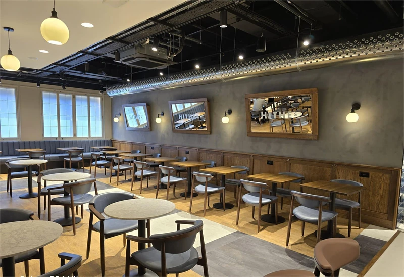 Completed Hithes restaurant interior with pendant lighting and banquette seating