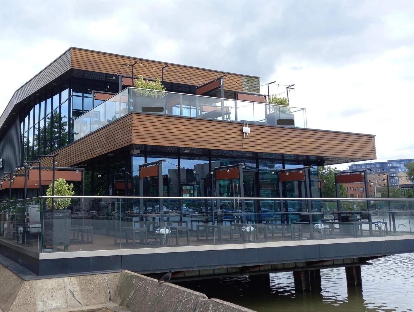 Wagamama Lincoln dockside restaurant with hardwood cladding across two levels